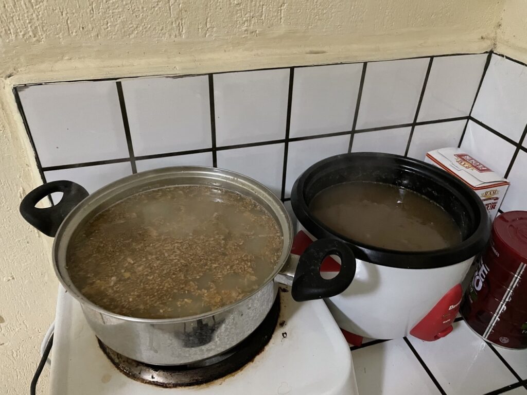Boiling grated ginger 